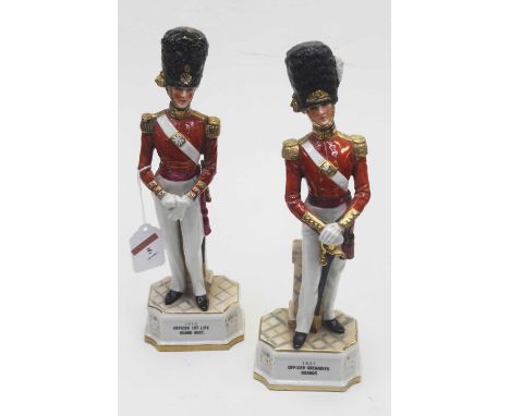 A pair of Continental porcelain figures of soldiers, to include an Officer of the First Life Guard Regiment, and Officer of t