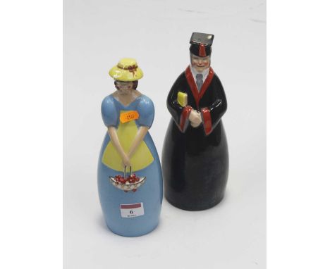 A Roby of Paris glazed ceramic figural decanter, in the form of a male scholar, together with one other similar example in th