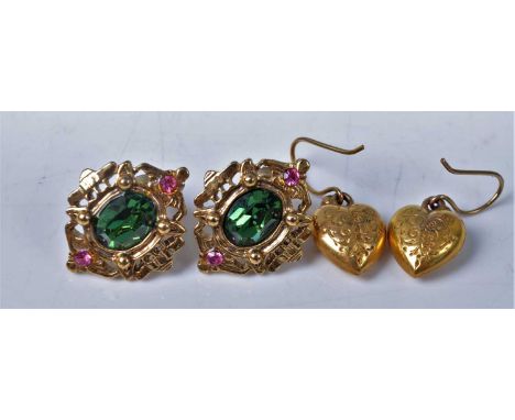 A pair of 9ct gold ear pendants, on shepherd's crook fittings, 1.4g; together with a pair of gilt metal and paste set ear stu