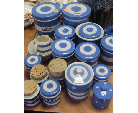 A collection of Cornish ware in the Electric Blue pattern, to include storage jars and covers for, Bicarbonate of Soda, Bakin