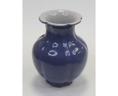 A Chinese export stoneware vase, of squat melon form, on a blue ground, with blue seal mark verso, h.20cm