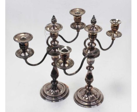 A pair of early 20th century silver plated three sconce table candelabra