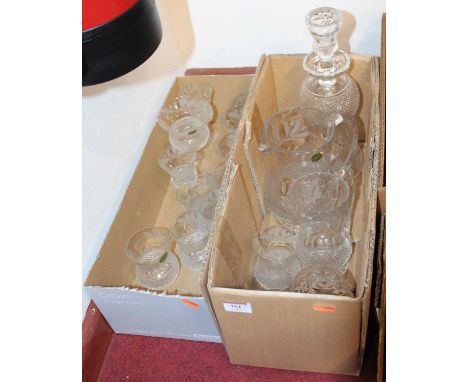 A set of Scottish crystal glassware drinking glasses, pitchers, and a decanter, with hobnail and etched thistle decoration, t