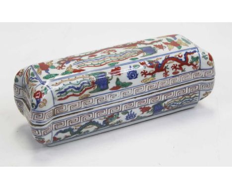 A Chinese export stoneware casket and cover, of rectangular form, having proud corners, with a Greek Key type frieze, enamel 