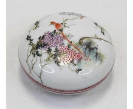 A Chinese export jar and cover, of domed circular form, the cover enamel decorated with a bird amidst flowers and foliage, wi