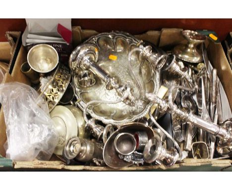 A box of miscellaneous metalware, to include pair of silver plated candelabra, loose steel flatware, Victorian cake basket et