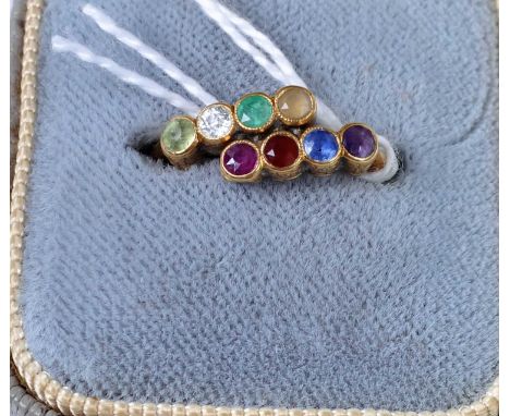 An 18ct gold, precious set 'Regard' ring, to include ruby, diamond, emerald, sapphire, garnet etc, 2.1g, size G/H