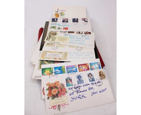A collection of stamps and first day covers 