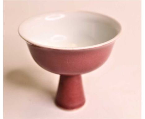 A Chinese export oxblood glazed stem cup of plain undecorated form, height 9cmCondition report: Scratch to the glaze.Discolou