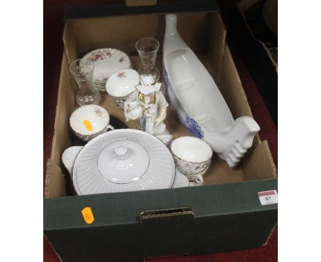 A box of china and glassware, to include Continental porcelain figure of a boy holding a jug with geese at his feet; Victoria