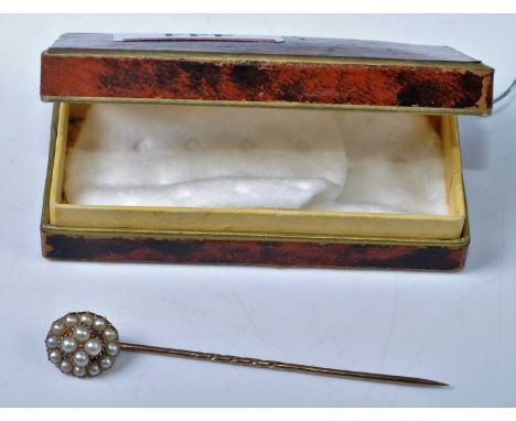 An Edwardian yellow metal and seed pearl set tie-pin, 3g