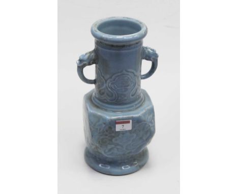 A Chinese export blue glazed stoneware vase, having a cylindrical neck with zoomorphic twin handles to a hexagonal base and c