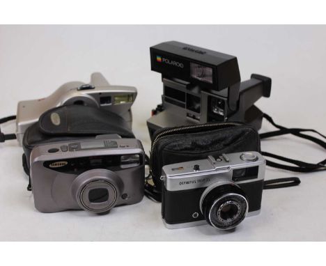 A Polaroid Sun 600 LMS camera, cased, together with another similar