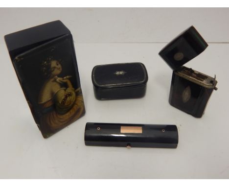 A George III yellow metal mounted tortoiseshell toothpick case with domed cover together with a tortoiseshell etui case, a pa