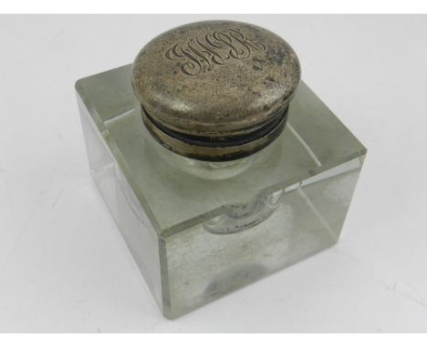 A silver topped and glass inkwell, hallmarked  London 1908. H. 10cm