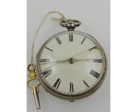 A mid 19th century silver open faced pocket watch, the enamel dial marked Roman numerals, engine turned case with vacant cart