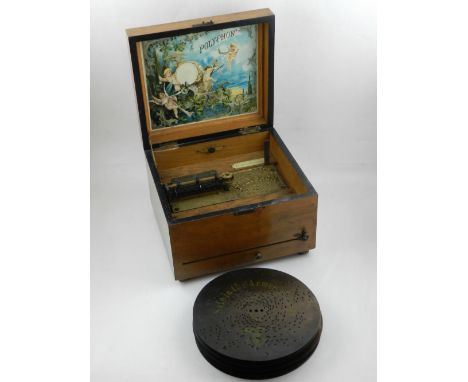 A late 19th / early 20th century Polyphon disc musical box, having walnut case, together with fifteen disks.