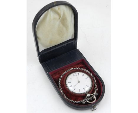 A small white metal pocket watch, the enamel dial marked Roman numerals with Breguet hands, engine turned case, fitted fob ch