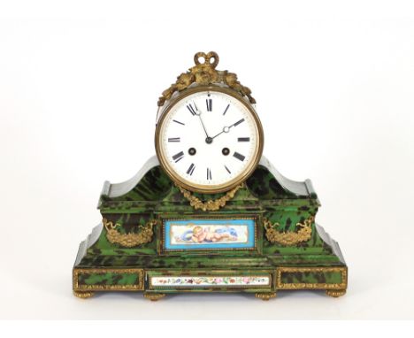A French faux tortoise shell and gilt metal mounted mantel clock, having Sevres style panels, the circular white enamel dial 