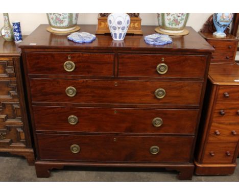 A 19th Century mahogany chest, of two short and three long graduated drawers, raised on bracket feet, 117cm wide