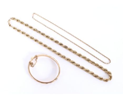 A 9 carat gold snap bangle; a 9 carat gold rope twist decorated necklace; and a 9 carat gold fine link necklace set to a barr