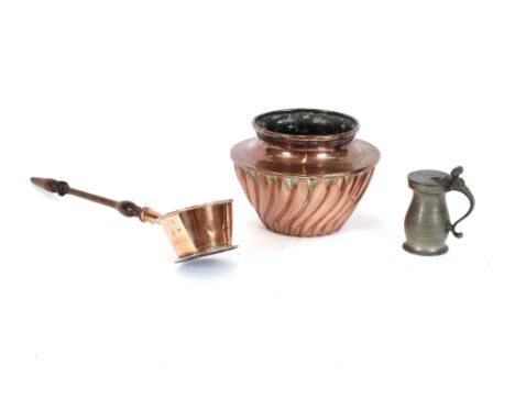 An Antique copper ladle, with turned wooden handle; a copper jardiniere with fluted body decoration; and a 19th Century pewte