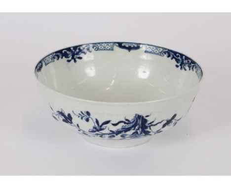 An 18th Century Worcester bowl, having fluted moulded body with floral spray decoration, the centre with a pattern of a fishe