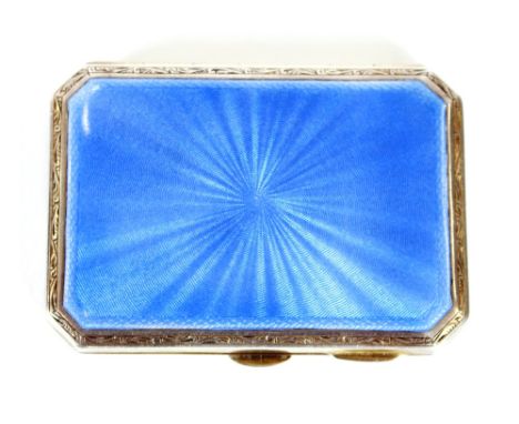 An Art Deco silver and blue enamel cigarette case, the gilded interior inscribed, "Wishing you the best of luck from your gir