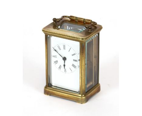 A brass cased carriage timepiece, having white enamel Roman numeral dial, height 11cm