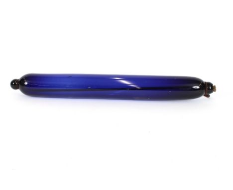 A large Bristol blue glass rolling pin, 79cm long