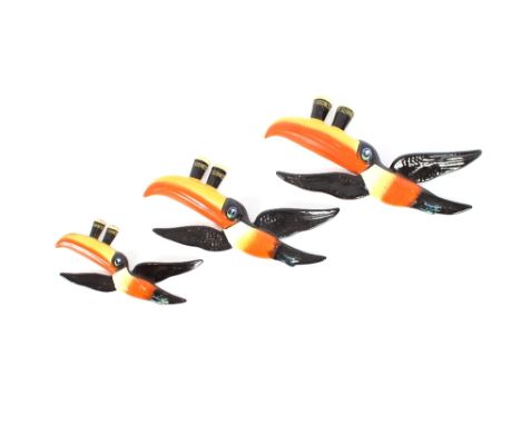 A graduated set of three flying Guinness Toucans, by Carltonware
