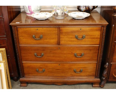 A 19th Century mahogany chest, of two short and two long drawers, raised on a shaped apron and squat bracket supports, 100cm 