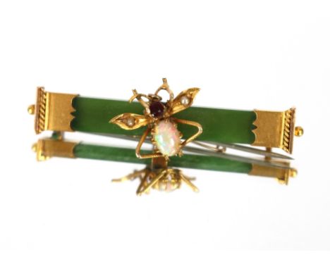 A jade and yellow metal mounted insect brooch, set with an opal