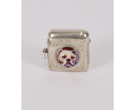 A silver and enamel vesta case, the central panel decorated with a boxer dog