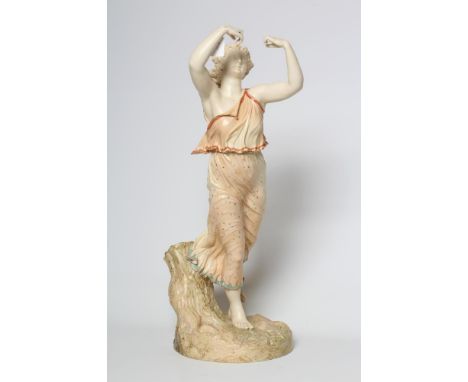 A LARGE ROYAL WORCESTER FIGURE, 1899, of a young maiden holding her arms aloft and playing a tambourine (replaced), wearing a