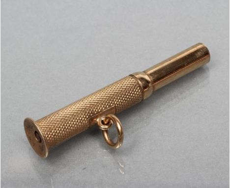 A 9CT GOLD CIGAR PIERCER, Birmingham 1949, with engine turned panel and hanging loop, 1 3/4" long, 6.4g gross (Est. plus 21% 