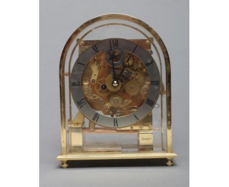 A KIENINGER MANTEL CLOCK, the exposed quarter chiming gong striking movement with eleven jewels and backplate numbered JO208,