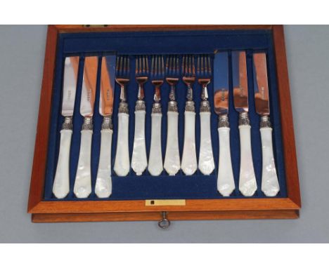 A SET OF SIX PAIRS OF VICTORIAN SILVER DESSERT KNIVES AND FORKS, maker Henry Wilkinson, Sheffield 1860, with plain blades and