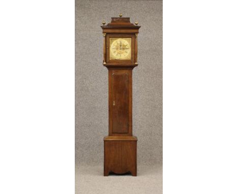 AN OAK LONGCASE signed John Lawson, the eight day movement with anchor escapement striking on a bell, 12" square brass dial s