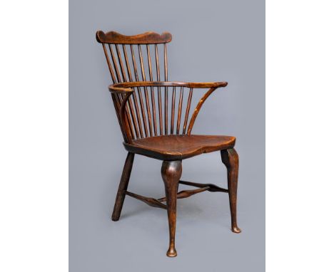 AN ASH AND ELM COMB BACK WINDSOR ARMCHAIR, probably Thames Valley, late 18th century, with waved and curved crest rail, round