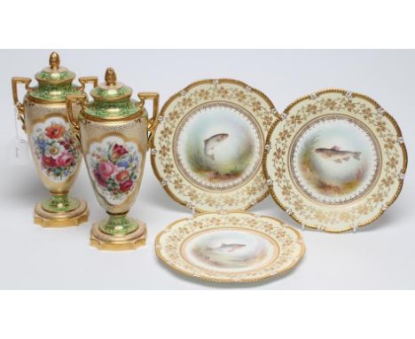 A PAIR OF COPELAND CHINA VASES AND COVERS, 1930's, painted by F. Adams with a loose bouquet of flowers on a gilt vermiculae a