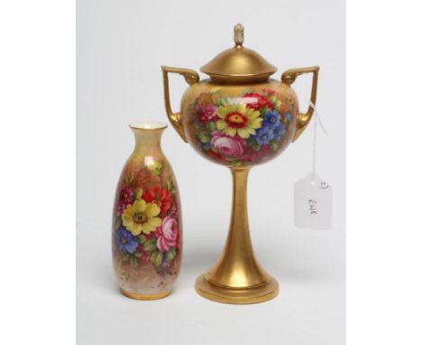 A ROYAL WORCESTER HIGH PEDESTAL BOWL AND COVER, 1936, the two handled globular bowl painted by E. Barker with a bouquet of fl