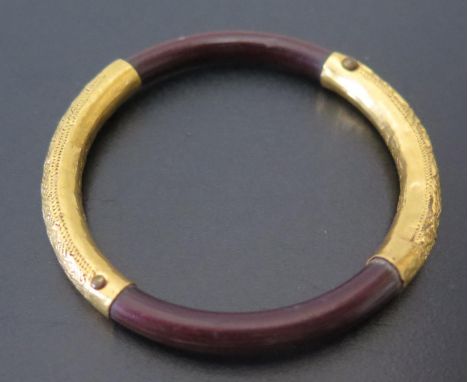 A Chinese High Carat Gold Mounted Bangle, impressed marks, 48mm diam., 5.2g 