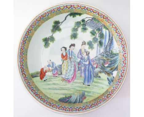 A 19th Century Chinese Famille Rose Shallow Dish decorated with nobles and two ladies and with two children playing with rabb