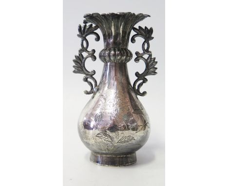 A Chinese Silver Two Handled Vase with chased decoration of sages and flowers, 184g, 15cm 