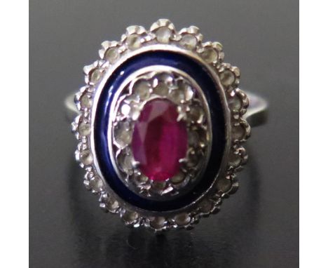 An 18ct White Gold, Ruby and Diamond Ring with blue enamel frame, size N, 4.6g 