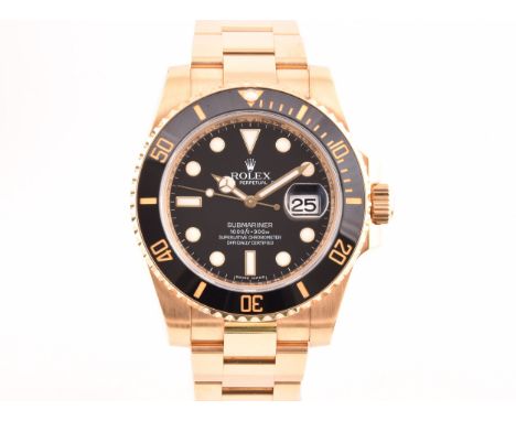 Rolex. An 18ct gold Rolex Submariner ref.&nbsp;116618LN automatic wrist watch, the black dial with luminous baton and roundel
