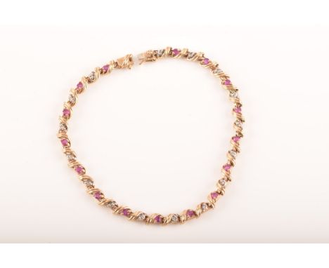 A ruby and diamond 9ct yellow gold line bracelet, set with sixteen round rubies with a combined approximate weight of 1.12 ca