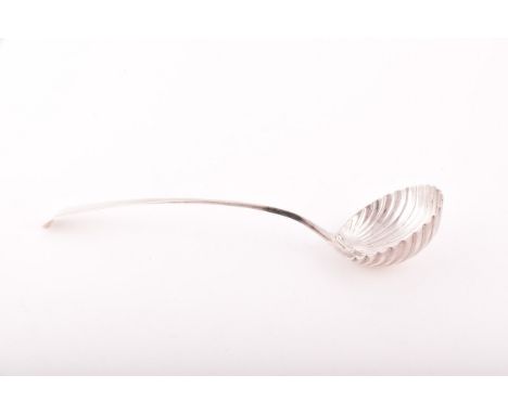 A George III silver ladle, hallmarked London 1775, by John Lambe, with a shell shaped bowl and old English pattern, 35cm long