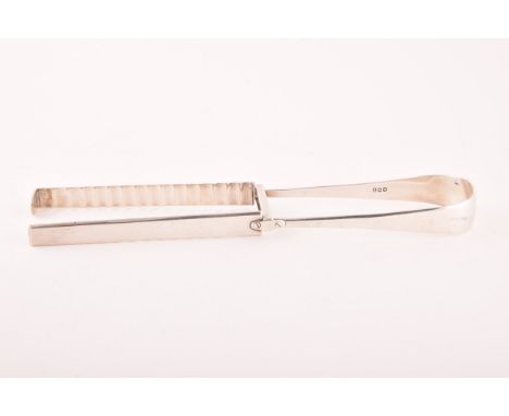 A pair of George III Asparagus silver tongs, hallmarked London 1807, by James Williams, 26cm long, 4.5 ozt / 142 grams.